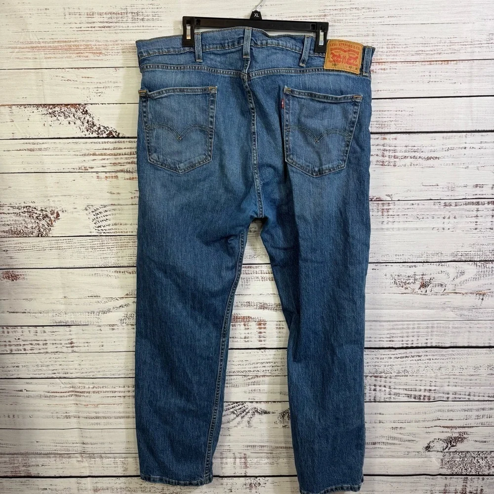 Levi’s 505 Jeans medium wash straight leg‎  relaxed size 40 denim jeans